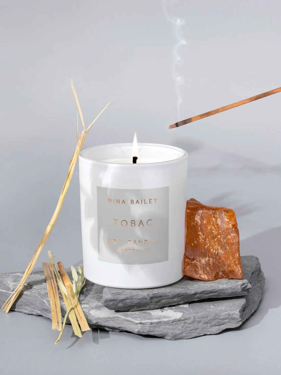 Tobac Luxe Soy Candle in White Glass Jar with Grey Lable by Nina Bailey